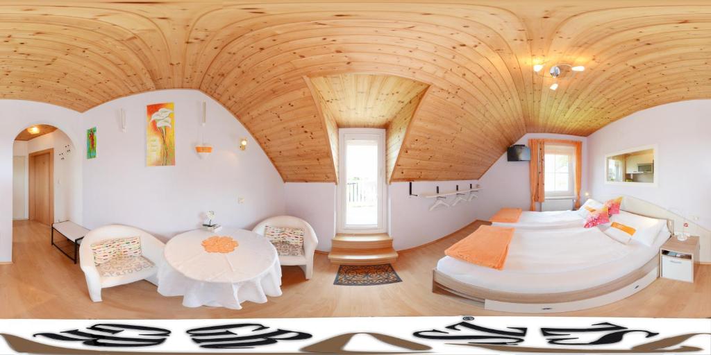 Posezení v ubytování Privatzimmer Haus Gschweitl