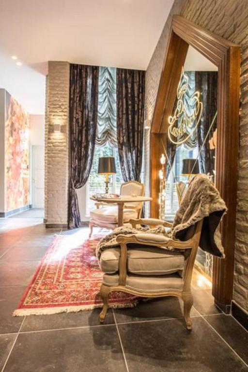 Posezení v ubytování Boutique Hotel De Castillion