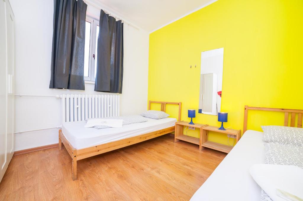 Postel nebo postele na pokoji v ubytování Patio Hostel