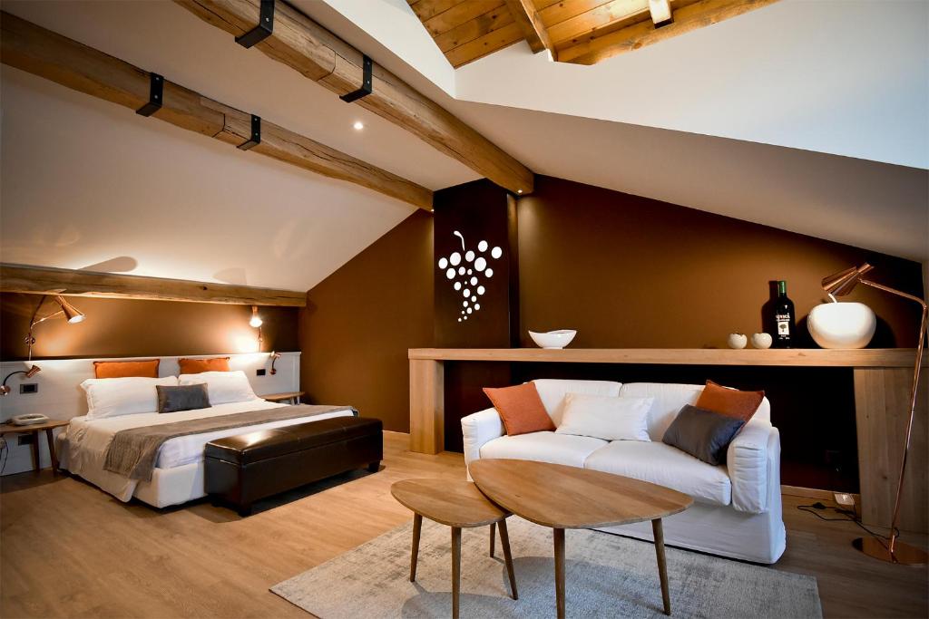 Postel nebo postele na pokoji v ubytování Venica & Venica Wine Resort