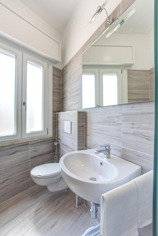 Koupelna v ubytování Hotel Elite