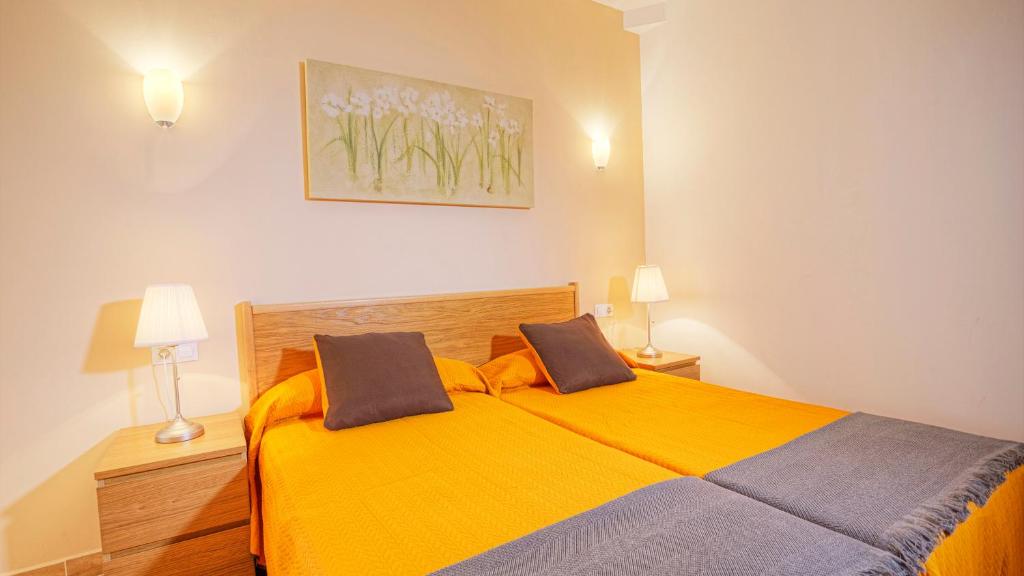 Postel nebo postele na pokoji v ubytování Edificio Prieto VIV 2C