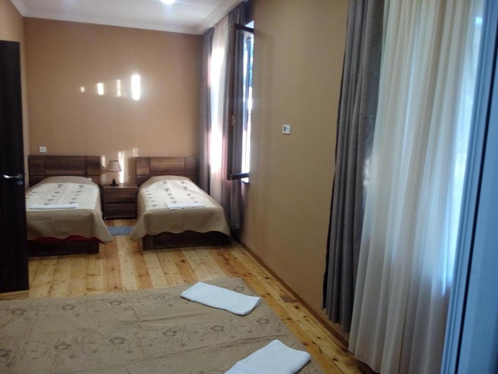Postel nebo postele na pokoji v ubytování Guest House Chirina