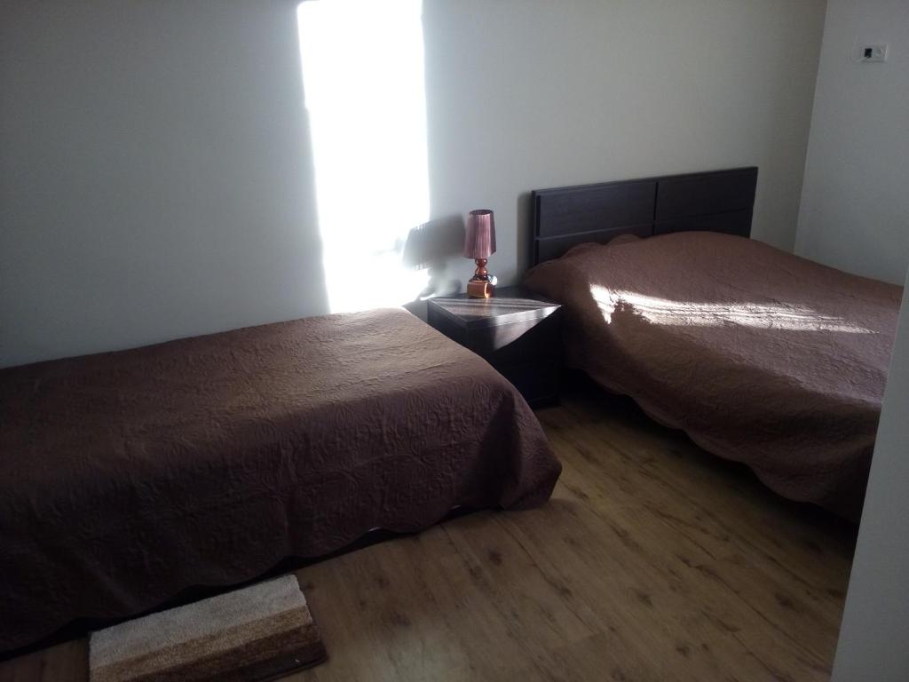Postel nebo postele na pokoji v ubytování Guest House Chirina