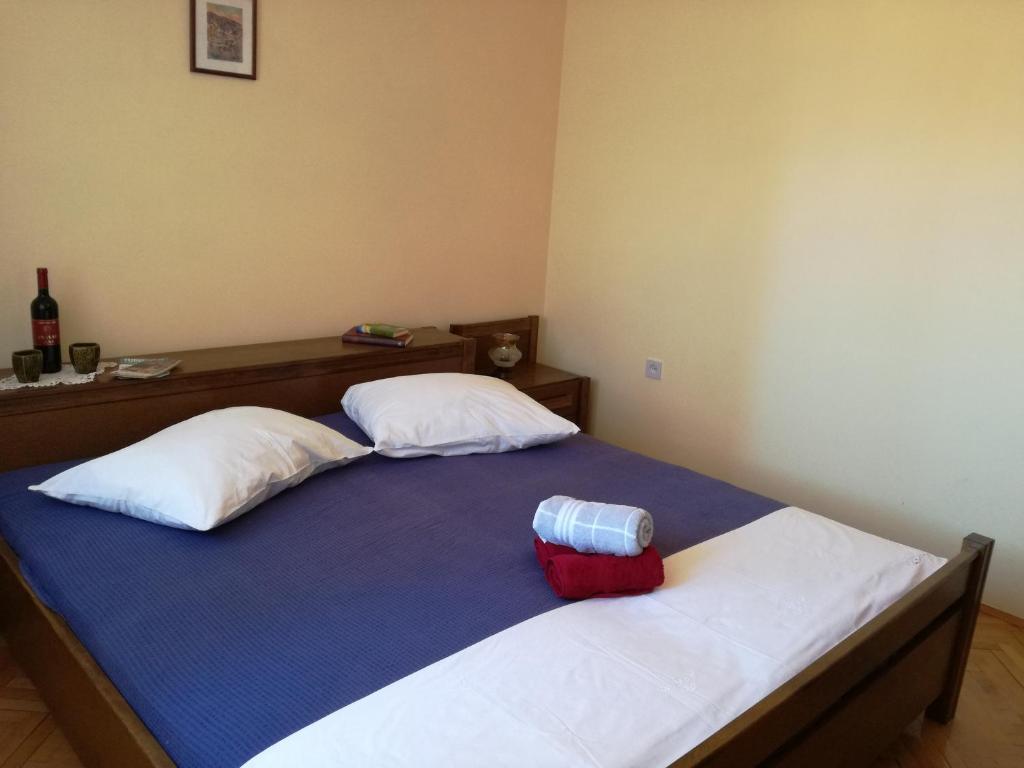 Posteľ alebo postele v izbe v ubytovaní apartman Kate