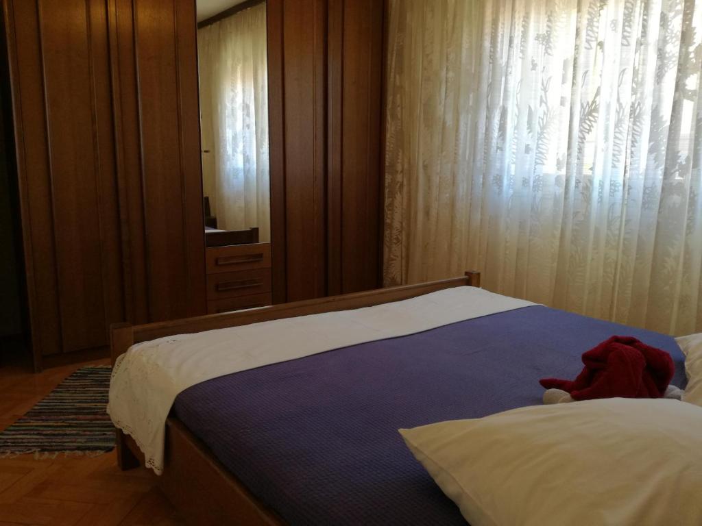 Posteľ alebo postele v izbe v ubytovaní apartman Kate