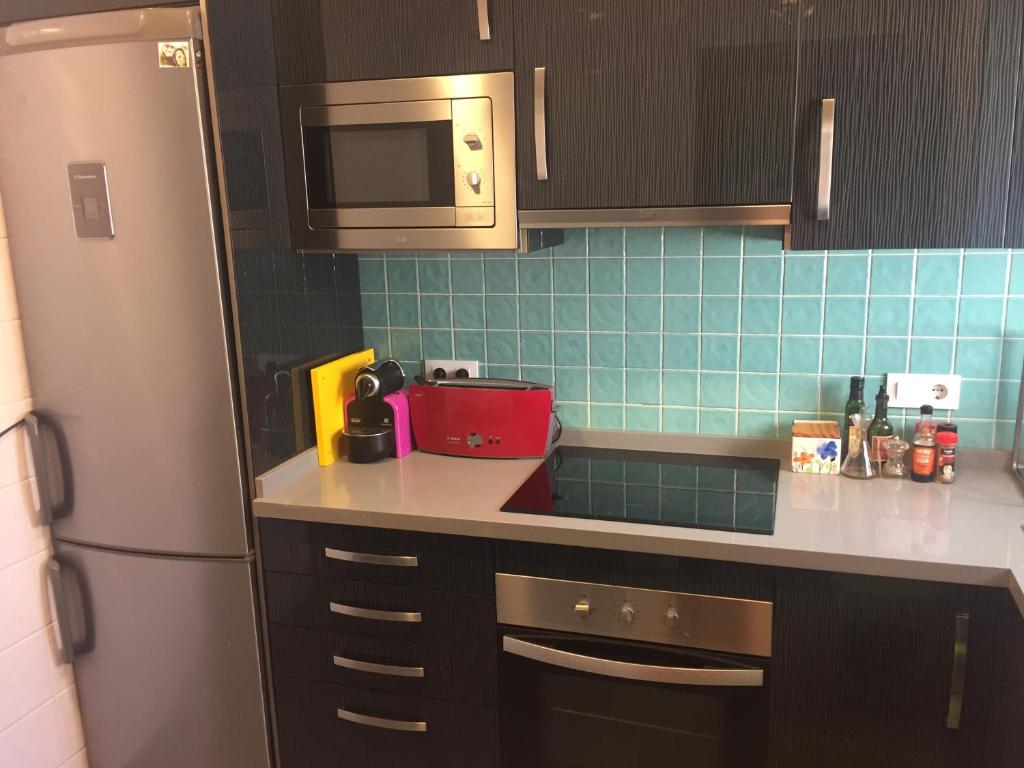 Kuchyňa alebo kuchynka v ubytovaní MONKEY Apartment