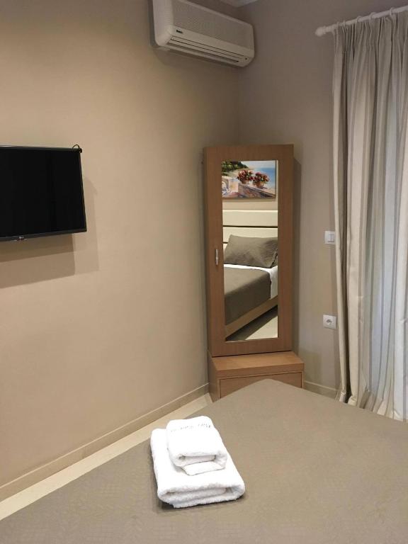 Posteľ alebo postele v izbe v ubytovaní Dimaras Apartments