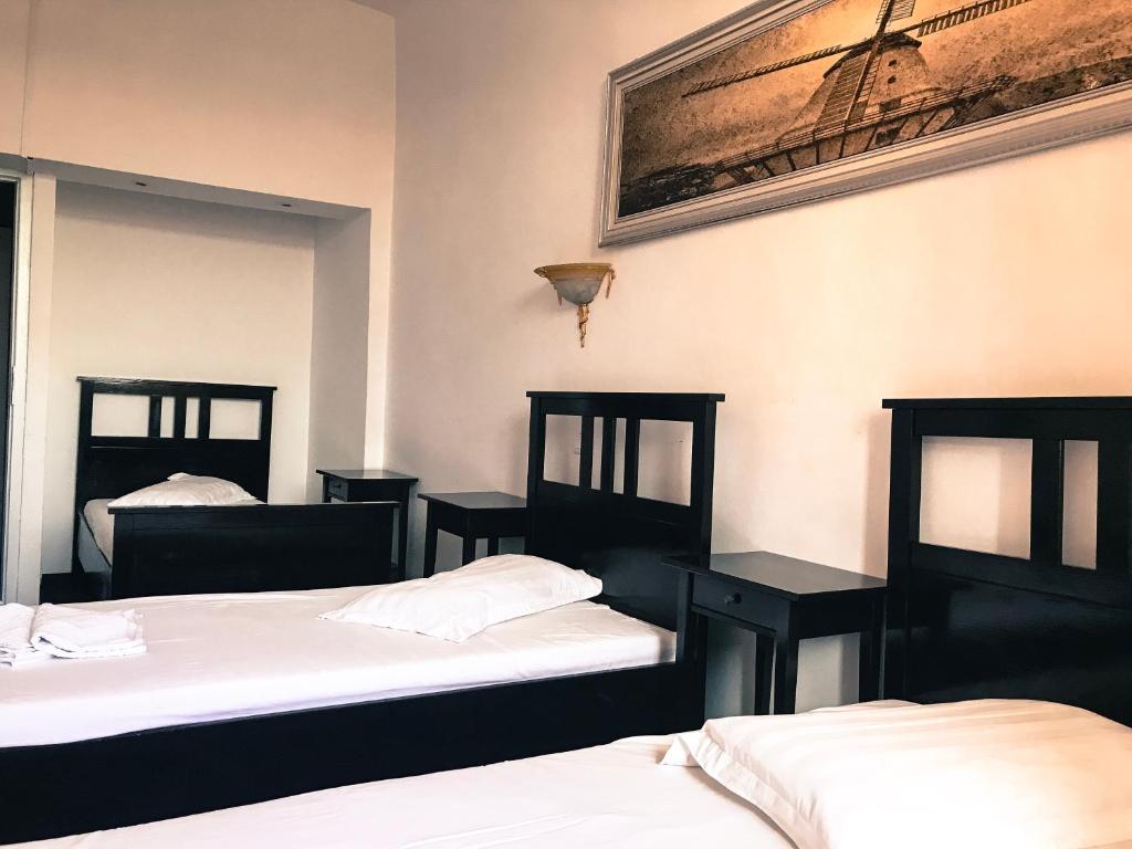 Postel nebo postele na pokoji v ubytování Hotel Funnytime