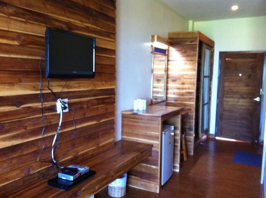 TV a/nebo společenská místnost v ubytování The Cinnamon & SaphanSufan Resort Kohmak