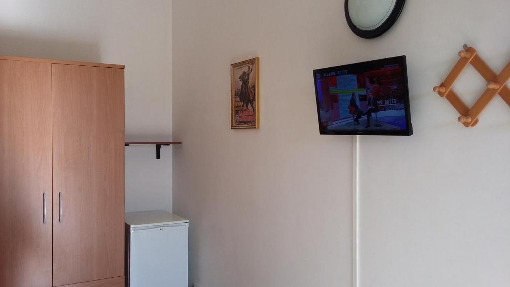 TV a/nebo společenská místnost v ubytování I Tre Ciliegi