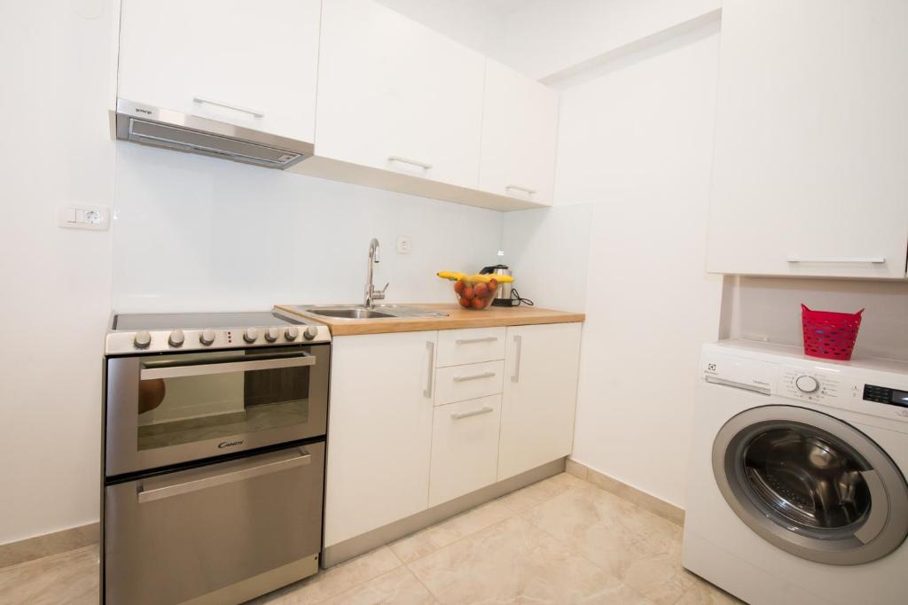 Kuchyňa alebo kuchynka v ubytovaní Apartment Spartion