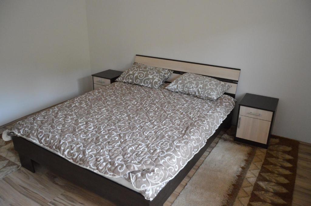 Postel nebo postele na pokoji v ubytování Apartment Sijakovic