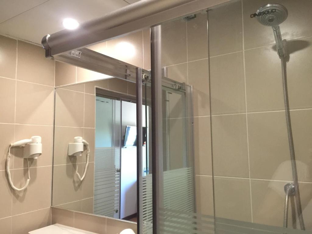 Koupelna v ubytování Check Inn Hotel Tawau