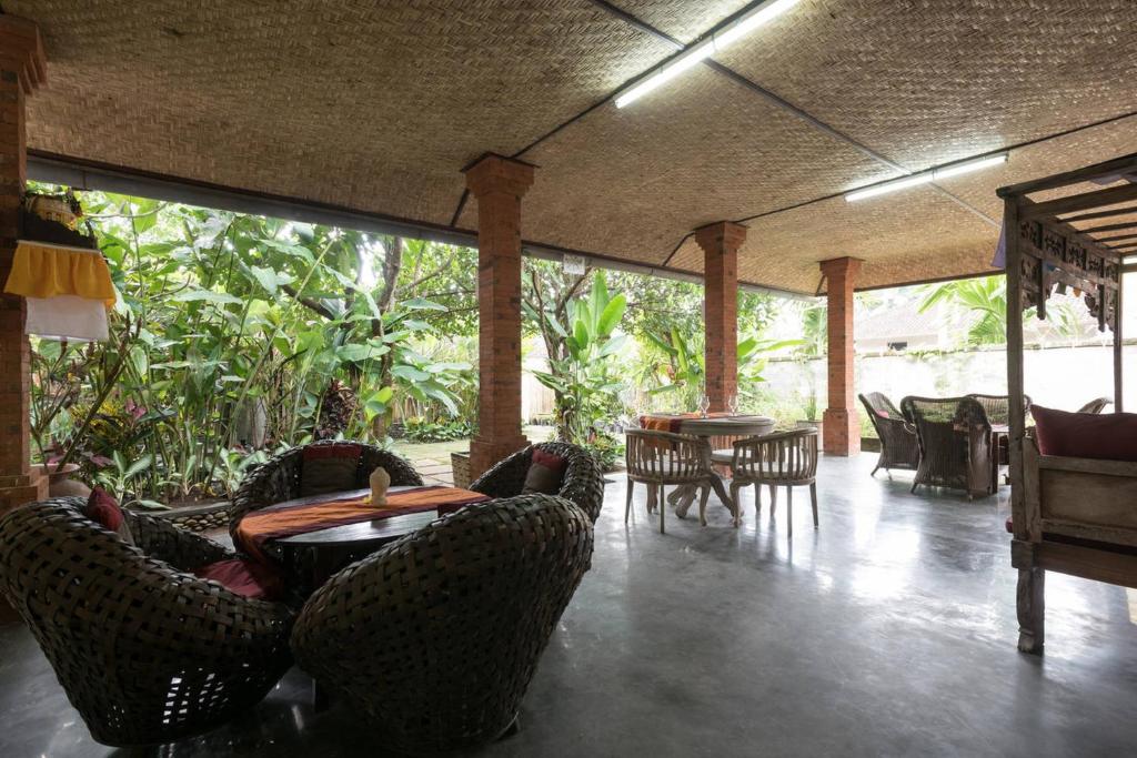 Posezení v ubytování Alam Pracetha Bali Ubud