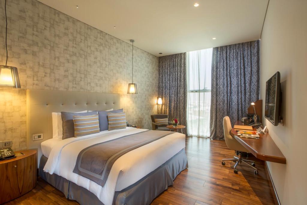 TV a/nebo společenská místnost v ubytování The Avenue Hotel