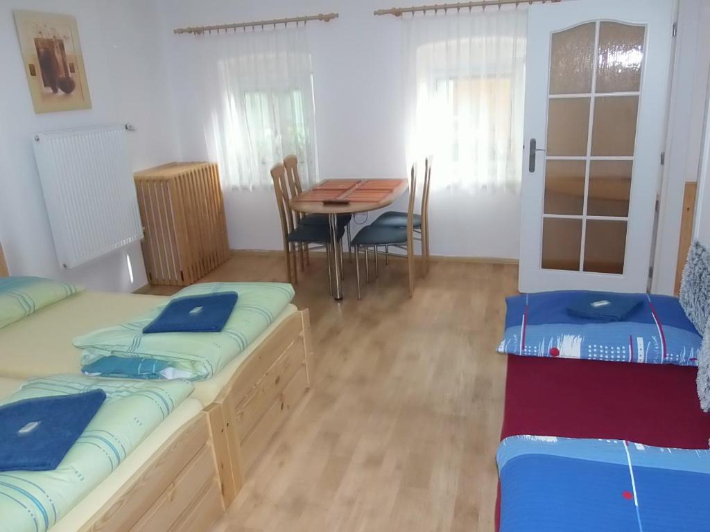 Postel nebo postele na pokoji v ubytování Penzion Netolice