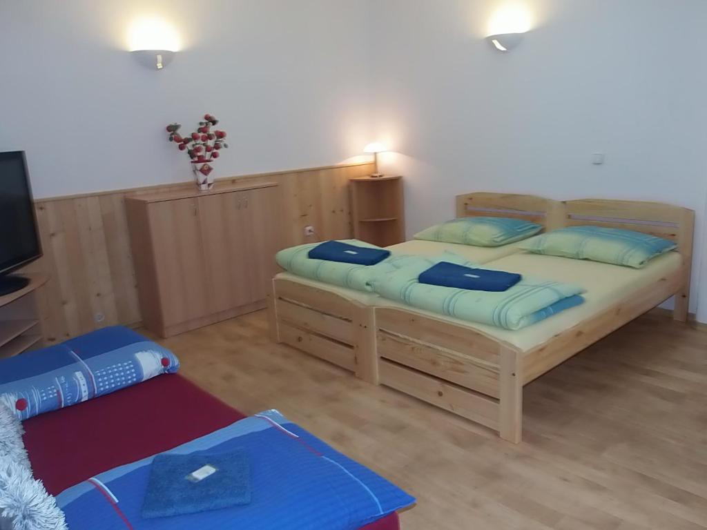 Postel nebo postele na pokoji v ubytování Penzion Netolice
