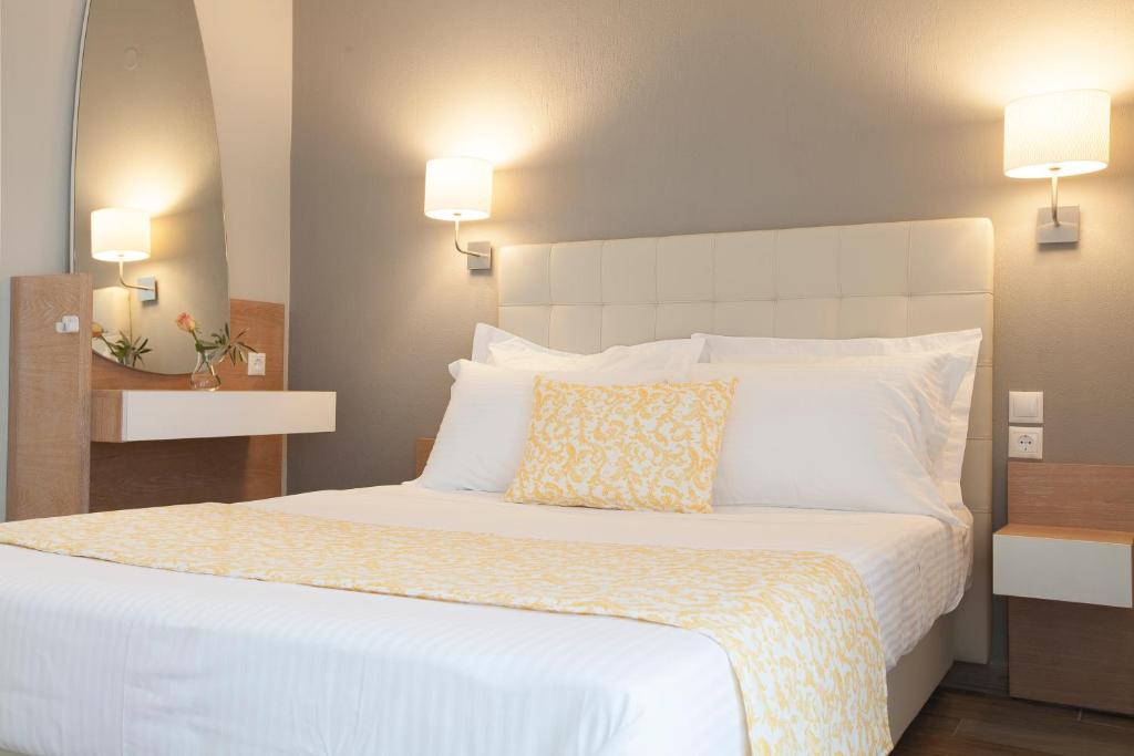 Postel nebo postele na pokoji v ubytování Enalia Villas