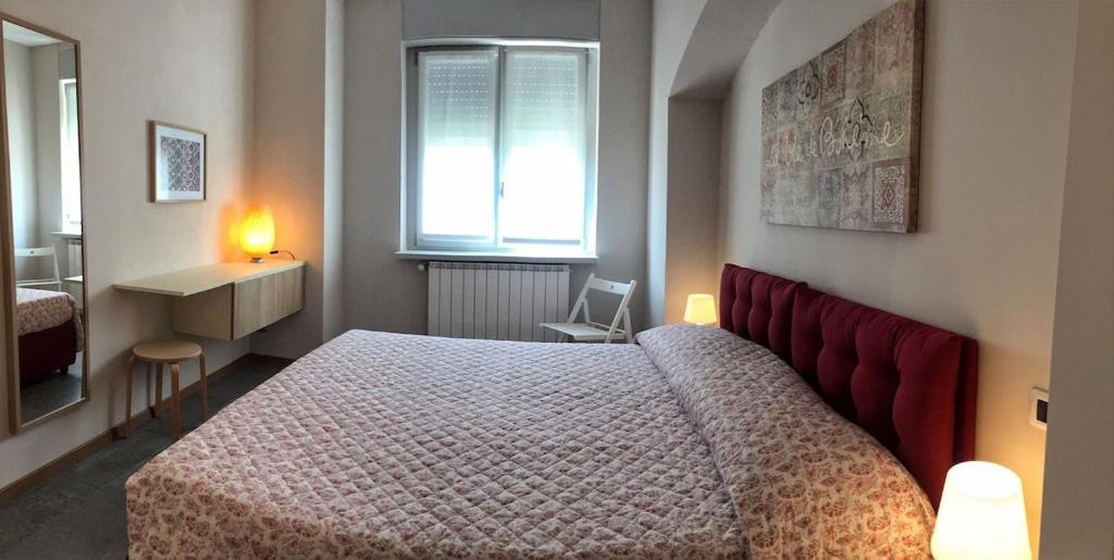 Postel nebo postele na pokoji v ubytování Oleandro 1 apartment in Villa Cerutti
