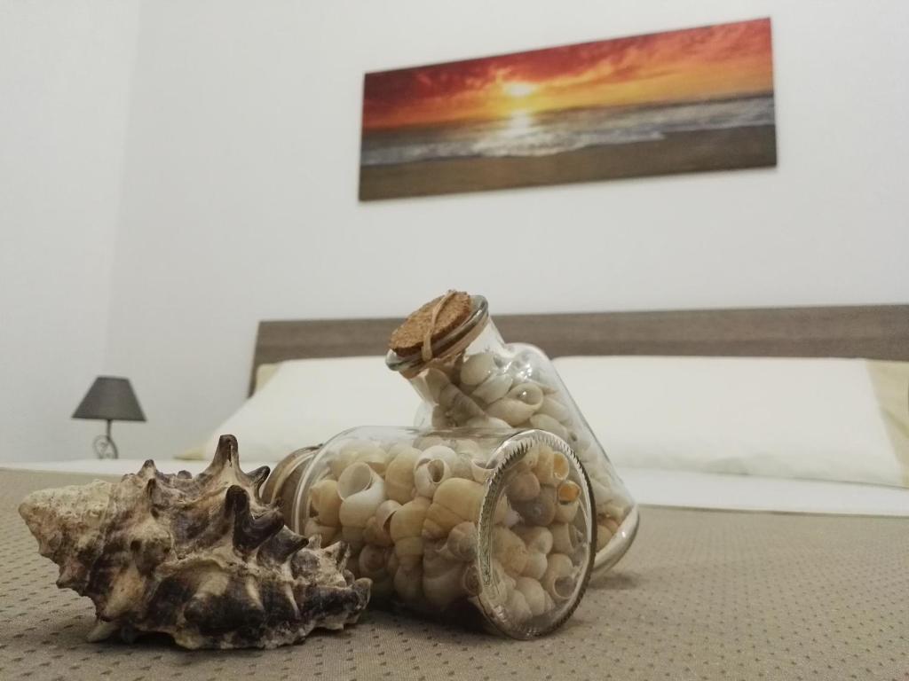 Postel nebo postele na pokoji v ubytování Il profumo del mare
