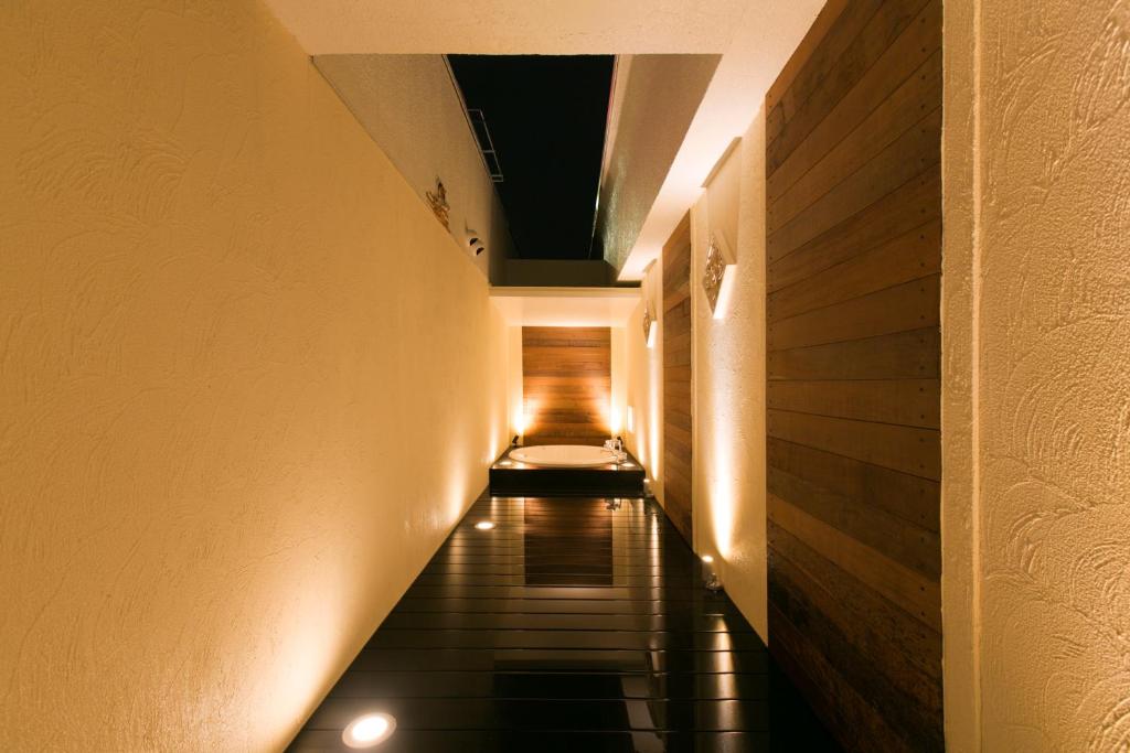 Postel nebo postele na pokoji v ubytování Hotel Atlantis Higashi Osaka (Adult Only)