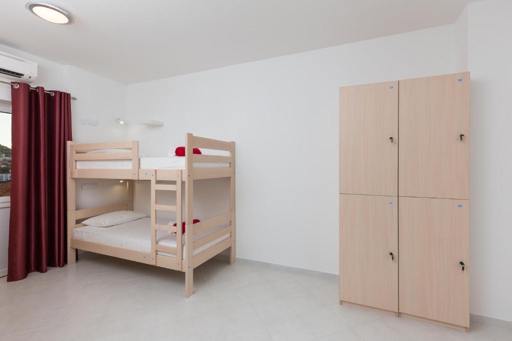Postel nebo postele na pokoji v ubytování Hostel Free Bird