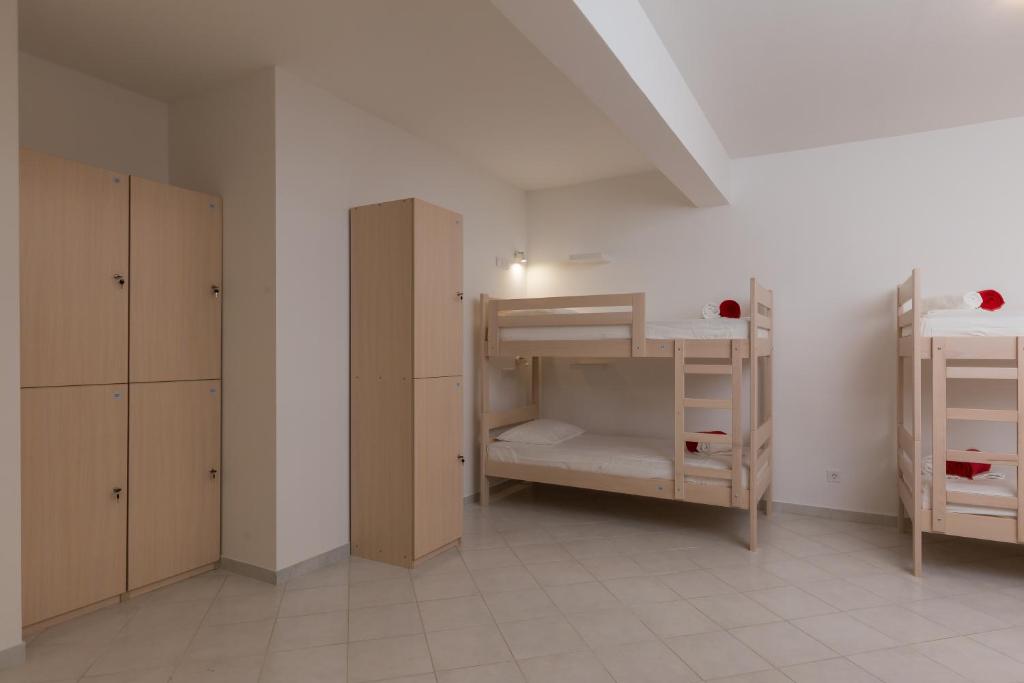 Postel nebo postele na pokoji v ubytování Hostel Free Bird