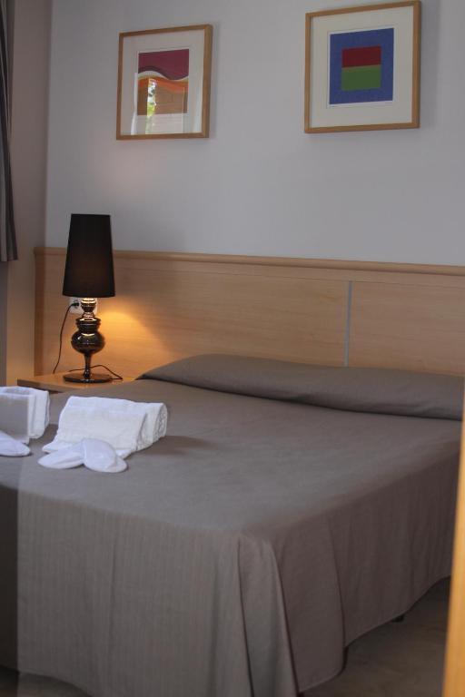 Posteľ alebo postele v izbe v ubytovaní Aparthotel Marsol