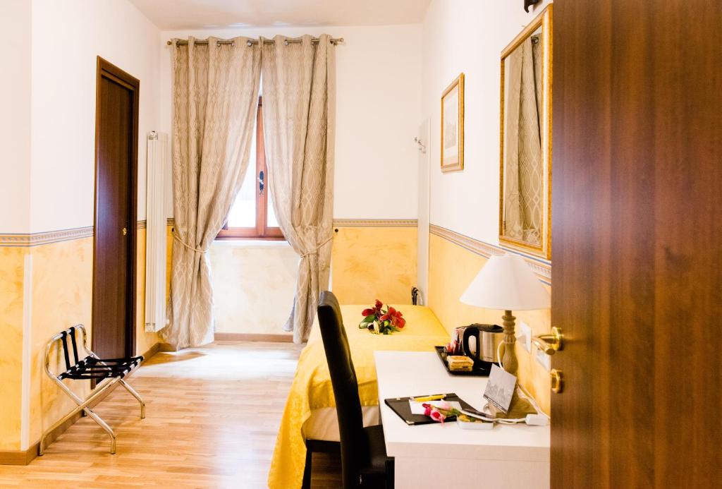 Posteľ alebo postele v izbe v ubytovaní Domus Popolo