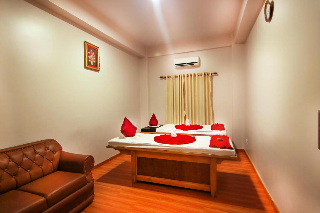 Voodi või voodid majutusasutuse Kuti Resort & Spa toas