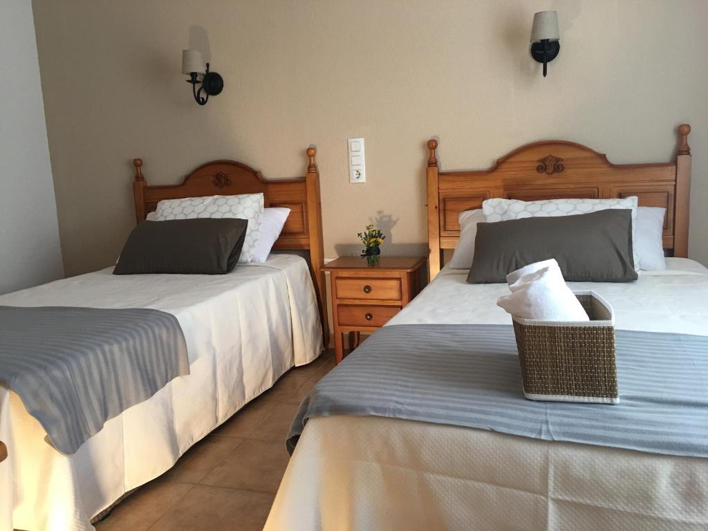 Postel nebo postele na pokoji v ubytování Hostal El Paso