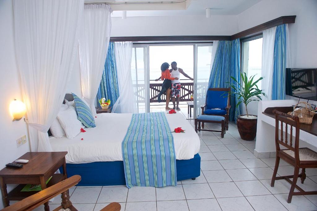 Postel nebo postele na pokoji v ubytování Voyager Beach Resort