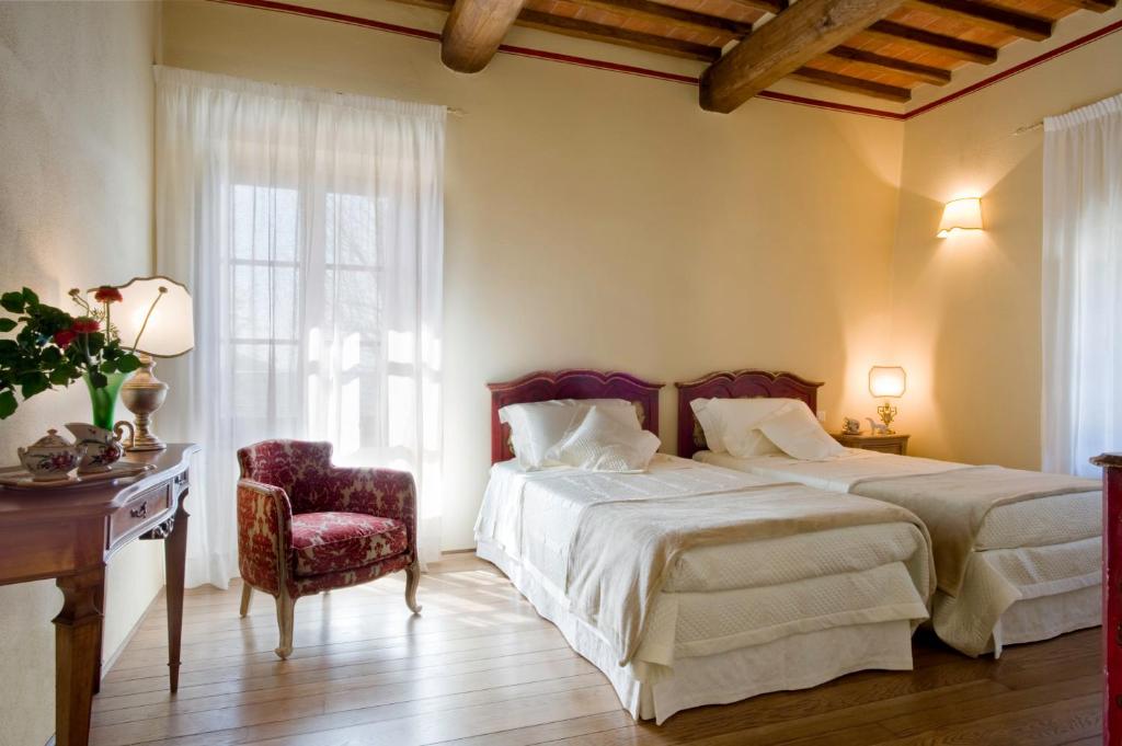 Postel nebo postele na pokoji v ubytování Borgo I Vicelli Adults Only Relais