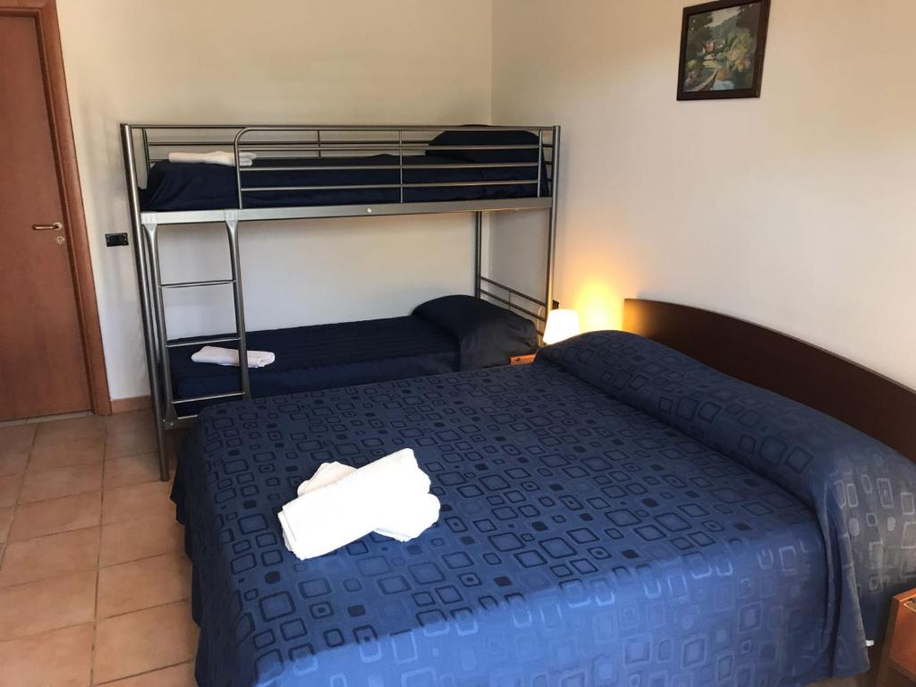 Postel nebo postele na pokoji v ubytování Hotel Diamond Residence