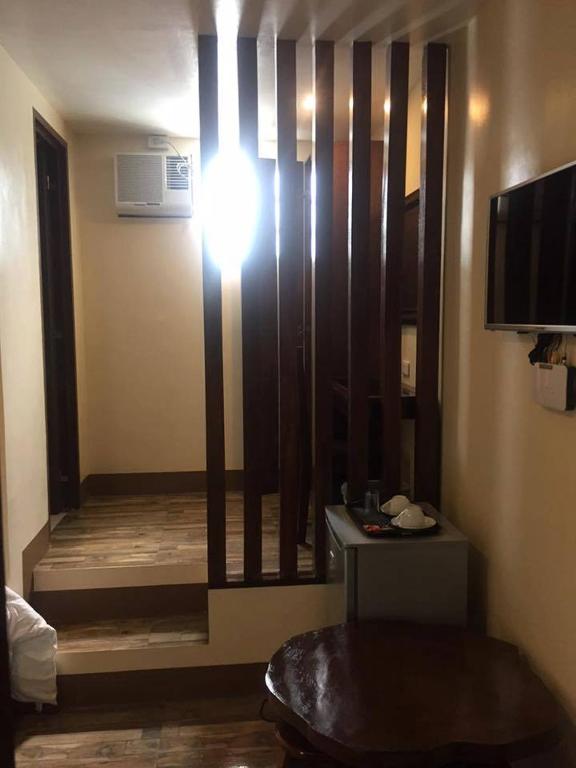 TV a/nebo společenská místnost v ubytování Hotel Maefinn