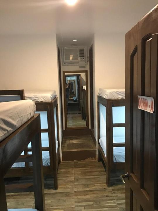 Postel nebo postele na pokoji v ubytování Hotel Maefinn