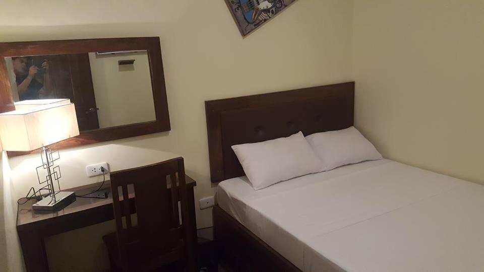 Postel nebo postele na pokoji v ubytování Hotel Maefinn