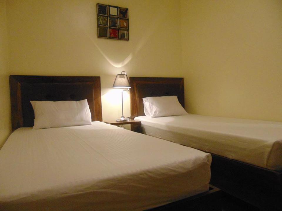 Postel nebo postele na pokoji v ubytování Hotel Maefinn