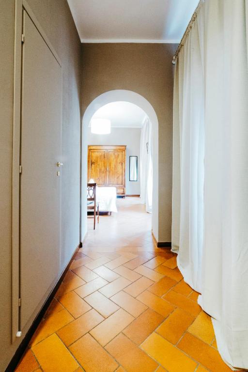Posteľ alebo postele v izbe v ubytovaní Residenza Ognissanti