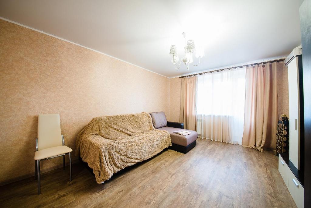 Zona de estar de Nikolaevskie Apartments