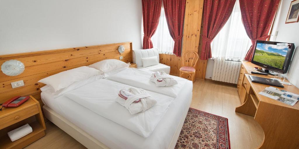 TV a/nebo společenská místnost v ubytování Hotel Livigno