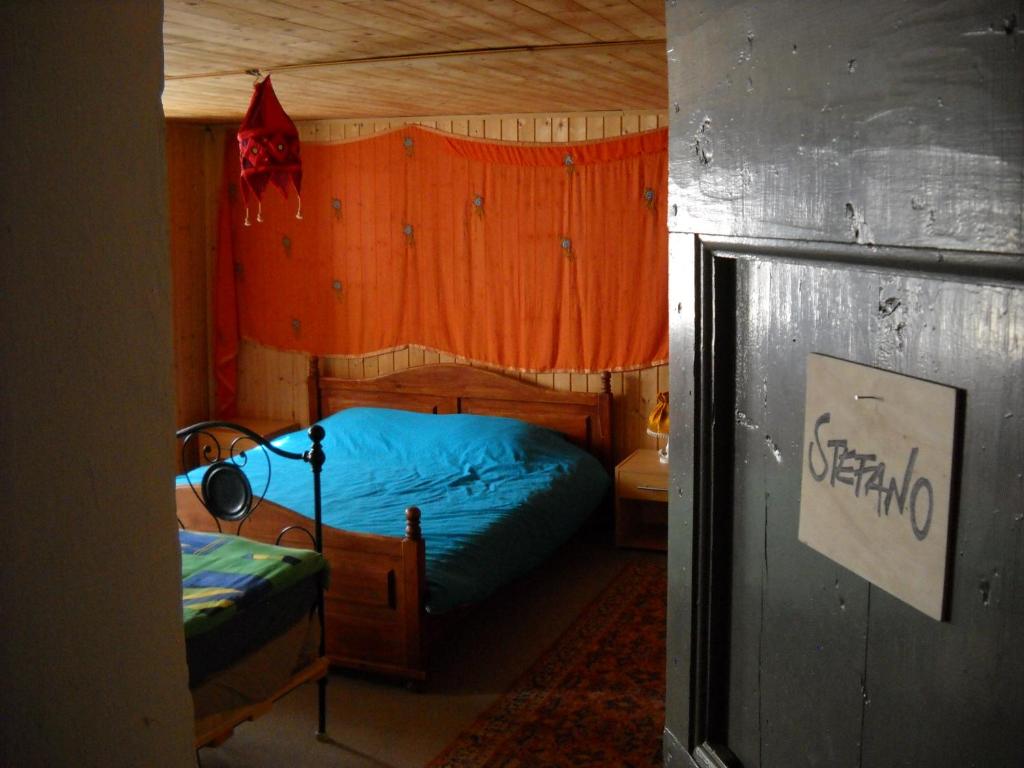 Postel nebo postele na pokoji v ubytování Guesthouse By Wild