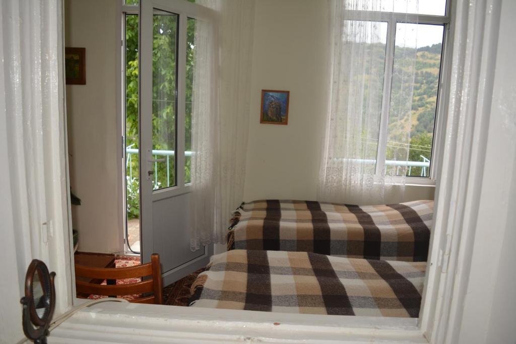 Postel nebo postele na pokoji v ubytování Sweet Home