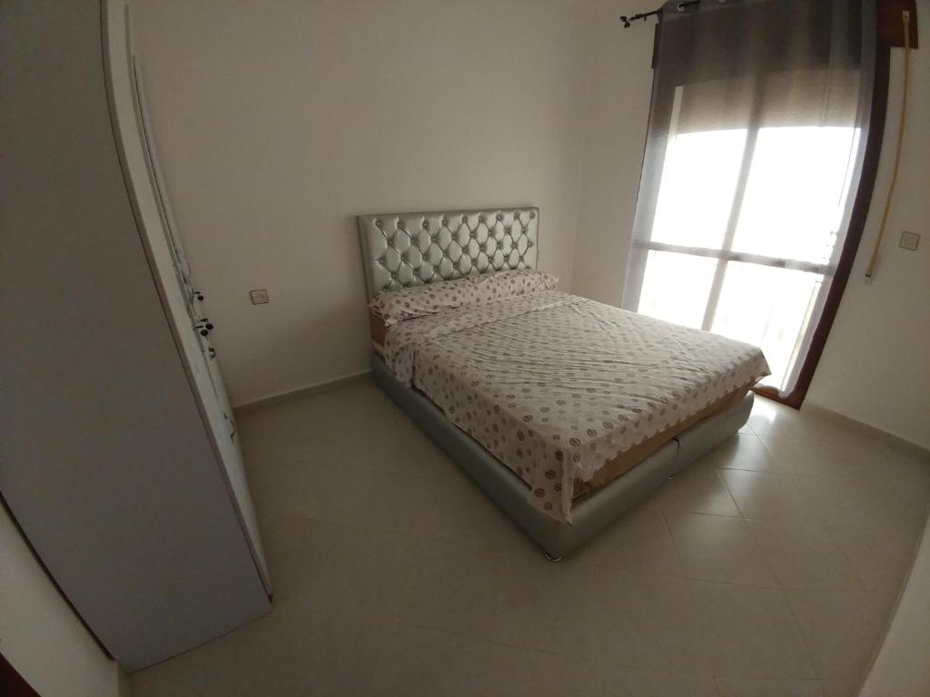 Postel nebo postele na pokoji v ubytování Oued Laou Apartment