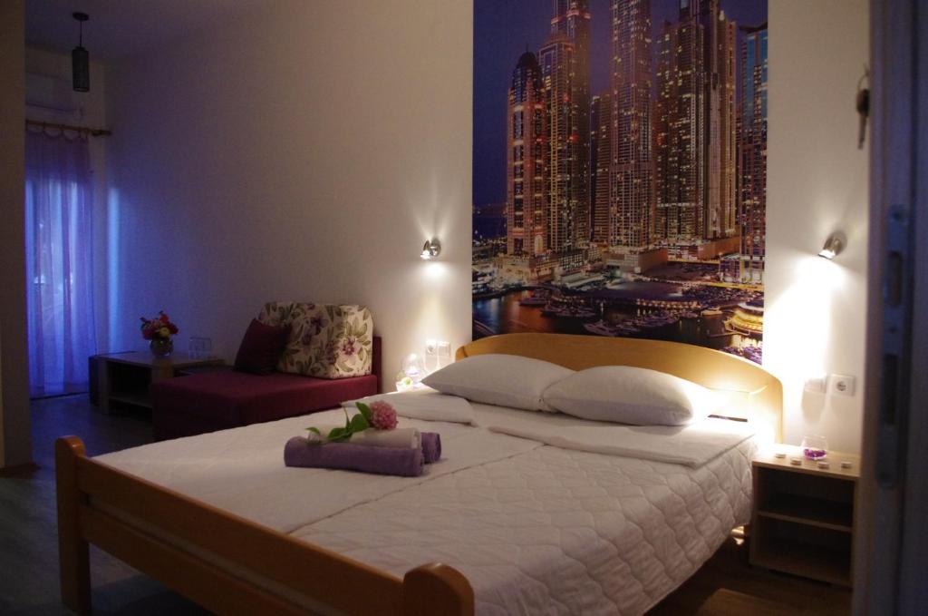 En eller flere senge i et værelse på Vila Dušica