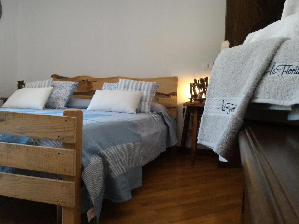 Postel nebo postele na pokoji v ubytování Masseria la Fiorita