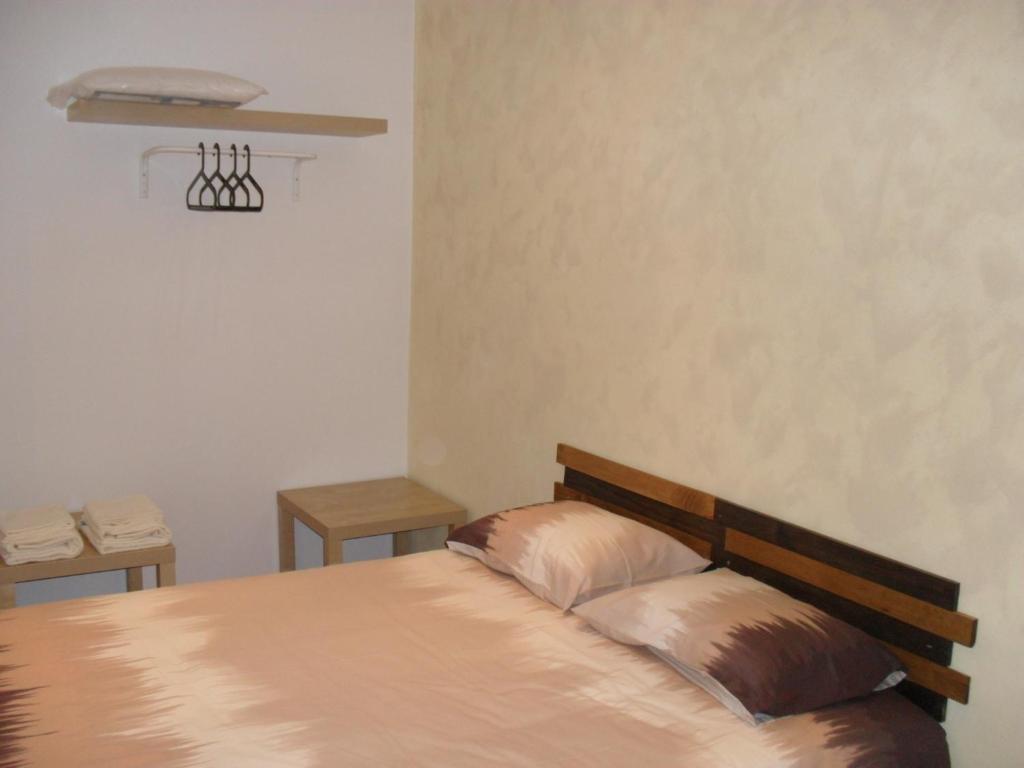 Postel nebo postele na pokoji v ubytování Green Wave Hostel