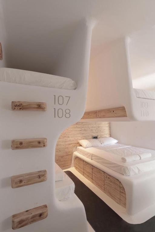 Postel nebo postele na pokoji v ubytování MyCocoon Hostel