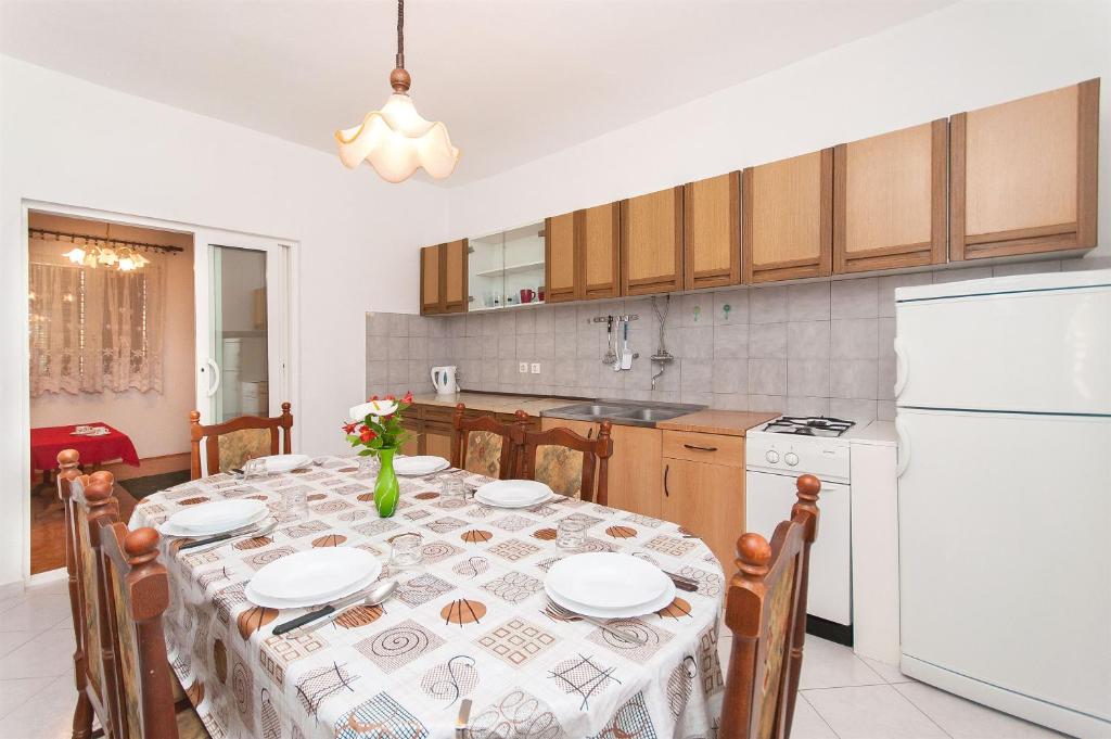 Kuchyň nebo kuchyňský kout v ubytování Apartment Slavko